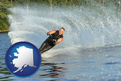 alaska a young man waterskiing on a lake