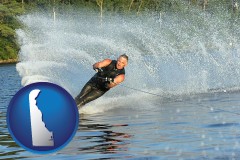 delaware map icon and a young man waterskiing on a lake