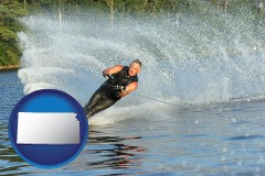 kansas a young man waterskiing on a lake