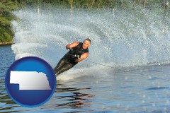 nebraska a young man waterskiing on a lake