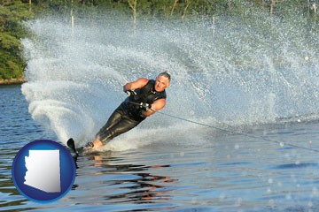 a young man waterskiing on a lake - with Arizona icon